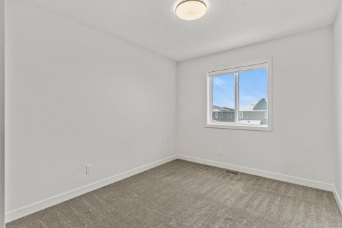 128 Fireside Way, Cochrane, AB - Indoor Photo Showing Other Room