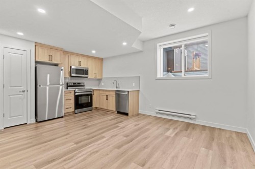 128 Fireside Way, Cochrane, AB - Indoor Photo Showing Kitchen