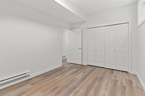 128 Fireside Way, Cochrane, AB - Indoor Photo Showing Other Room