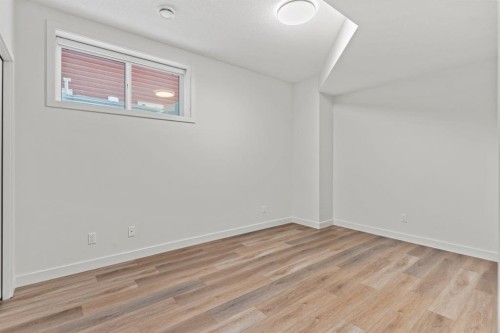 128 Fireside Way, Cochrane, AB - Indoor Photo Showing Other Room