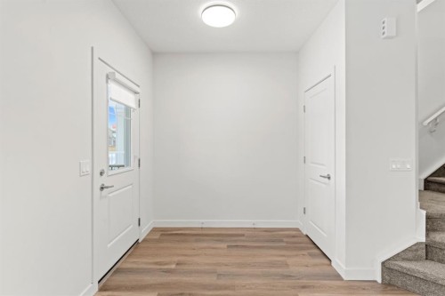 128 Fireside Way, Cochrane, AB - Indoor Photo Showing Other Room