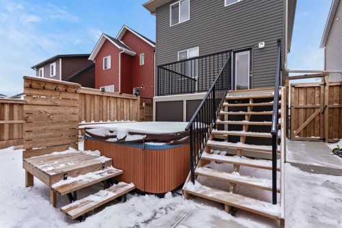 128 Fireside Way, Cochrane, AB - Outdoor With Deck Patio Veranda With Exterior