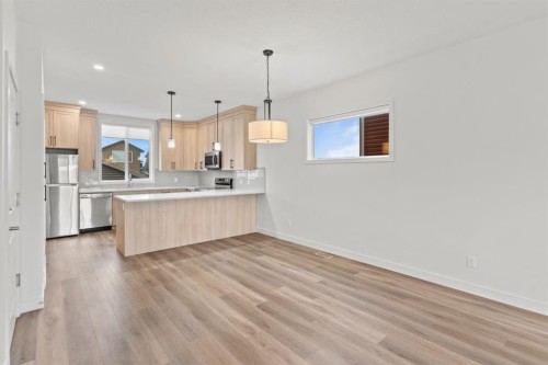 128 Fireside Way, Cochrane, AB - Indoor Photo Showing Kitchen