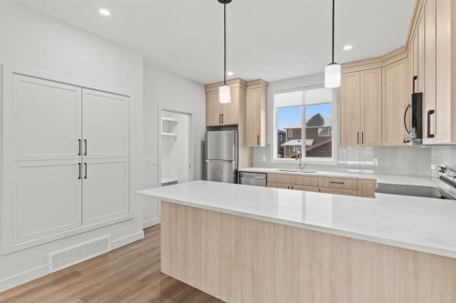 128 Fireside Way, Cochrane, AB - Indoor Photo Showing Kitchen
