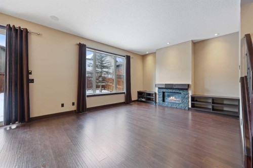 226 Sage Meadows Circle Nw, Calgary, AB - Indoor Photo Showing Other Room With Fireplace