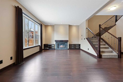 226 Sage Meadows Circle Nw, Calgary, AB - Indoor With Fireplace