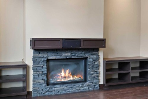 226 Sage Meadows Circle Nw, Calgary, AB - Indoor Photo Showing Living Room With Fireplace