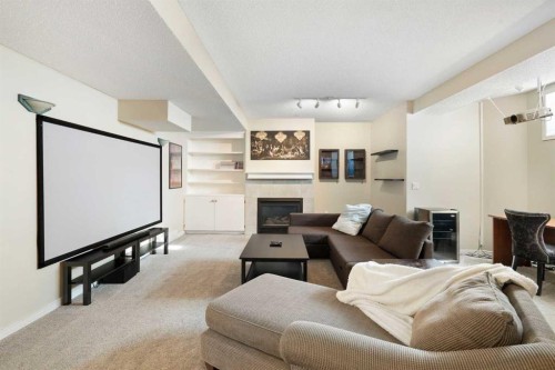 15 Mt Norquay Gate Se, Calgary, AB - Indoor With Fireplace