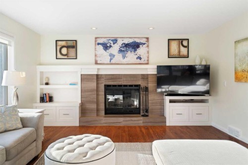 15 Mt Norquay Gate Se, Calgary, AB - Indoor Photo Showing Living Room With Fireplace
