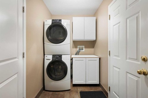 15 Mt Norquay Gate Se, Calgary, AB - Indoor Photo Showing Laundry Room