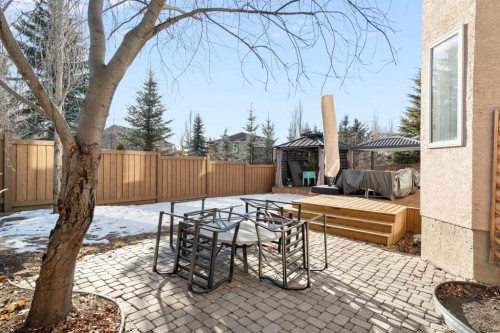 15 Mt Norquay Gate Se, Calgary, AB - Outdoor With Deck Patio Veranda