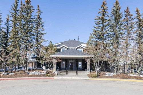15 Mt Norquay Gate Se, Calgary, AB - Outdoor With Deck Patio Veranda With Facade