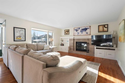 15 Mt Norquay Gate Se, Calgary, AB - Indoor Photo Showing Living Room With Fireplace