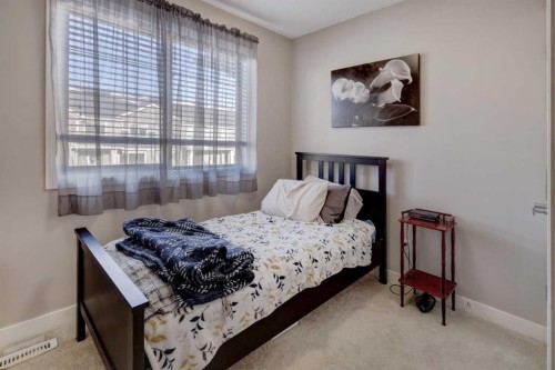 303-250 Sage Valley Road Nw, Calgary, AB - Indoor Photo Showing Bedroom