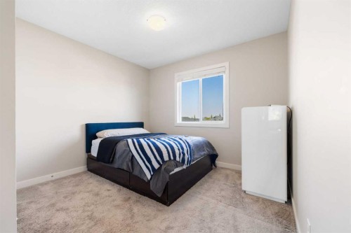 240 Sage Bank Grove Nw, Calgary, AB - Indoor Photo Showing Bedroom