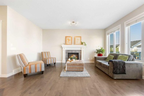 240 Sage Bank Grove Nw, Calgary, AB - Indoor Photo Showing Living Room With Fireplace