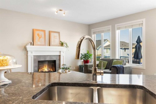 240 Sage Bank Grove Nw, Calgary, AB - Indoor With Fireplace