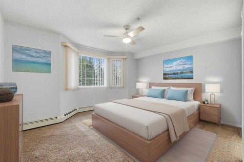 358-8535 Bonaventure Drive Se, Calgary, AB - Indoor Photo Showing Bedroom