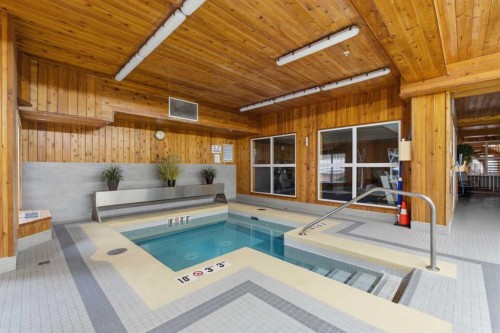 358-8535 Bonaventure Drive Se, Calgary, AB -  Photo Showing Other Room With In Ground Pool