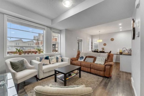 425 Saddlemont Boulevard Ne, Calgary, AB - Indoor Photo Showing Living Room