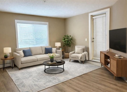 1112-81 Legacy Boulevard Se, Calgary, AB - Indoor Photo Showing Living Room