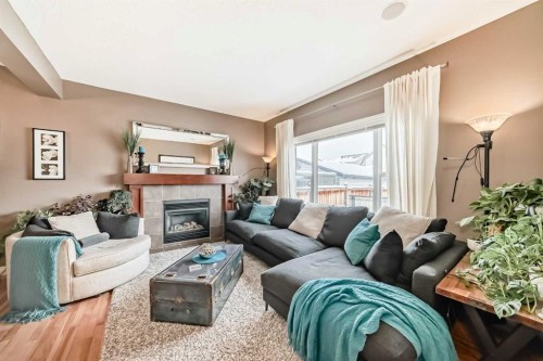 266 Copperstone Circle Se, Calgary, AB - Indoor Photo Showing Living Room With Fireplace