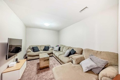 266 Copperstone Circle Se, Calgary, AB - Indoor Photo Showing Living Room