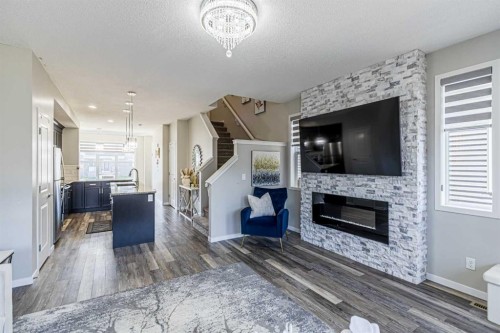 218 Cornerstone Avenue Ne, Calgary, AB - Indoor Photo Showing Living Room With Fireplace