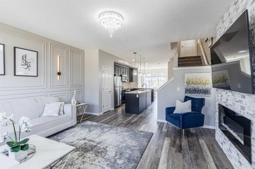 218 Cornerstone Avenue Ne, Calgary, AB - Indoor Photo Showing Living Room With Fireplace