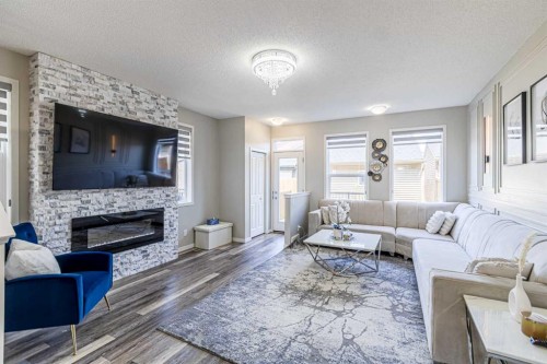 218 Cornerstone Avenue Ne, Calgary, AB - Indoor Photo Showing Living Room With Fireplace
