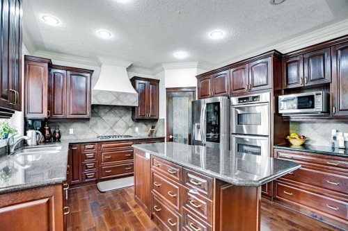 58 Evergreen Common Sw, Calgary, AB - Indoor Photo Showing Kitchen With Upgraded Kitchen