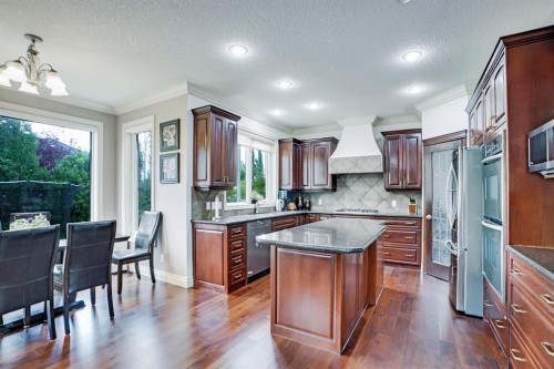 58 Evergreen Common Sw, Calgary, AB - Indoor Photo Showing Kitchen With Upgraded Kitchen