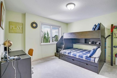 58 Evergreen Common Sw, Calgary, AB - Indoor Photo Showing Bedroom