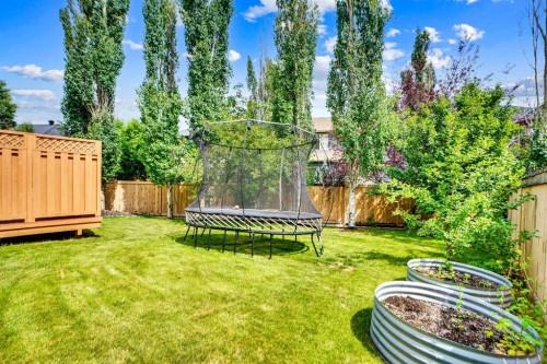 58 Evergreen Common Sw, Calgary, AB - Outdoor With Backyard