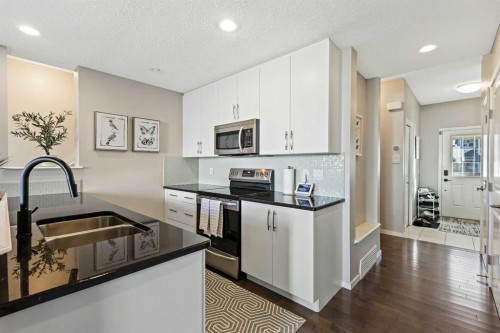 26 Chaparral Valley Common Se, Calgary, AB - Indoor Photo Showing Kitchen With Stainless Steel Kitchen With Double Sink