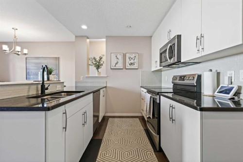 26 Chaparral Valley Common Se, Calgary, AB - Indoor Photo Showing Kitchen With Stainless Steel Kitchen With Double Sink With Upgraded Kitchen