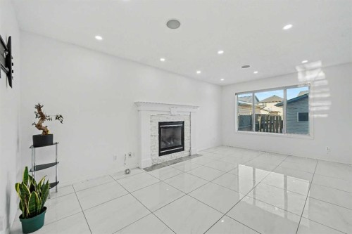 31 Skyview Springs Crescent Ne, Calgary, AB - Indoor Photo Showing Living Room With Fireplace
