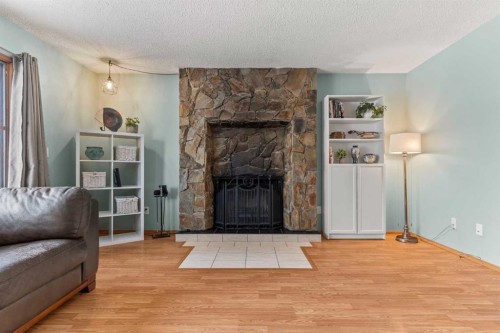 3804 62 Street Nw, Calgary, AB - Indoor Photo Showing Living Room With Fireplace