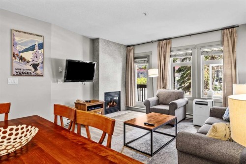 106-107 Montane Road, Canmore, AB - Indoor Photo Showing Living Room With Fireplace