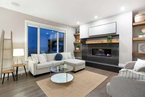 79 Cranarch Terrace Se, Calgary, AB - Indoor Photo Showing Living Room With Fireplace