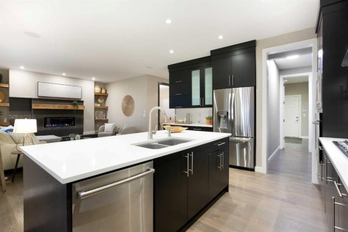 79 Cranarch Terrace Se, Calgary, AB - Indoor Photo Showing Kitchen With Double Sink With Upgraded Kitchen