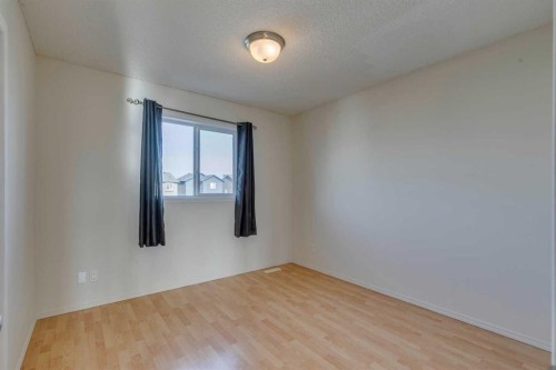 228 Luxstone Place Sw, Airdrie, AB - Indoor Photo Showing Other Room
