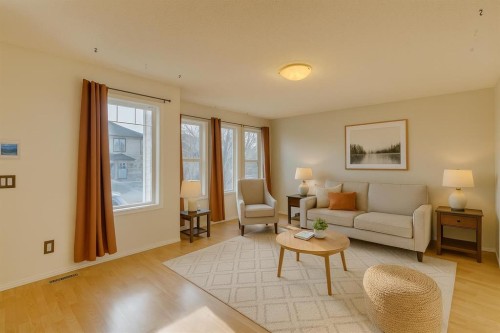 228 Luxstone Place Sw, Airdrie, AB - Indoor Photo Showing Living Room