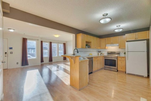 228 Luxstone Place Sw, Airdrie, AB - Indoor Photo Showing Kitchen