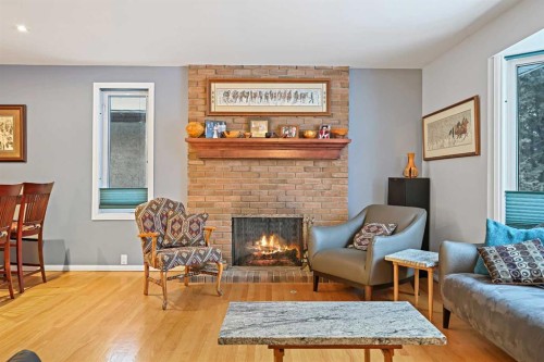 13119 6 Street Sw, Calgary, AB - Indoor Photo Showing Living Room With Fireplace