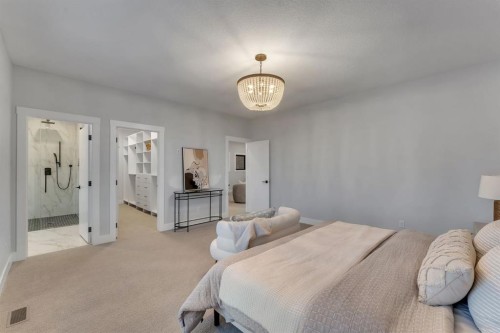 12 Spring Creek Point Sw, Calgary, AB - Indoor Photo Showing Bedroom