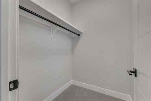 12 Spring Creek Point Sw, Calgary, AB - Indoor With Storage