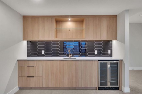 12 Spring Creek Point Sw, Calgary, AB - Indoor Photo Showing Kitchen