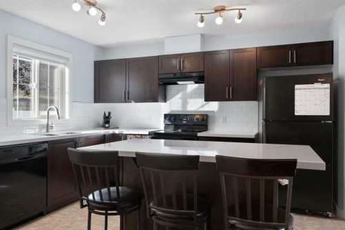 90 Pantego Lane Nw, Calgary, AB - Indoor Photo Showing Kitchen With Upgraded Kitchen