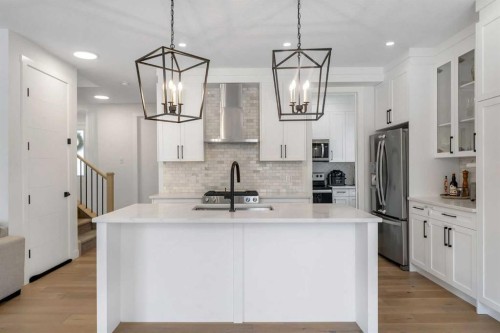 202 Kinniburgh Crescent, Chestermere, AB - Indoor Photo Showing Kitchen With Upgraded Kitchen